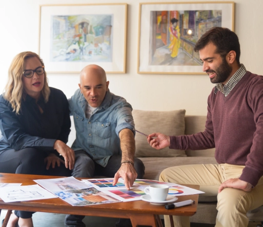 middle aged couple discussing home renovation project